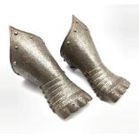 Pair of Victorian steel gauntlets in 16th century style with traces of decoration L30cm
