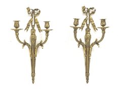 Pair late 20th Century gilt metal wall sconces, ruffled ribbon pediment on tapering husk stop fluted