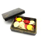 19th century Chinese Export lacquer games box containing various sized stained and plain gaming coun