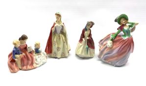 Four Royal Doulton figures comprising: Bess, Paisley Shawl, Bedtime Story and Autumn Breezes (4)