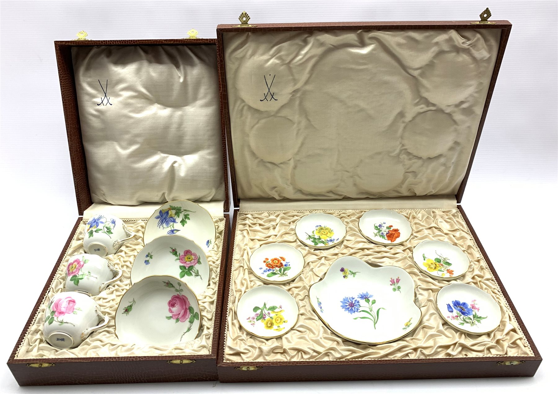 Cased set of three Meissen hand-painted cups and saucers together with similar boxed sweetmeat dishe