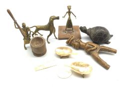 African tribal Lobi figural catapult, two African brass figures, two mother of pearl counters and o