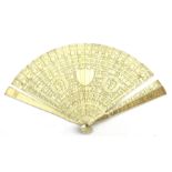 19th century Chinese Canton carved ivory brise fan: each pierced stick intricately carved on one sid