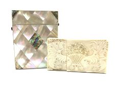 Two Victorian card cases to include a carved ivory example and another with Mother-of-pearl panelled