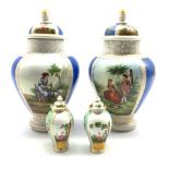 Pair of Continental Helena Wolfsohn style vases and covers H29cm together with a pair of similar sty