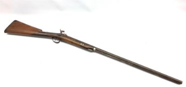 19th century percussion cap muzzle loading gun, the walnut stock with checkered fore-end, steel butt