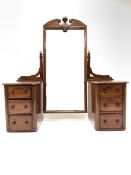 Victorian mahogany pedestal dressing table, the swing mirror with broken arch pediment, raised on tw