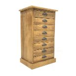 20th century light oak filing chest, fitted with eight drawers, raised on plinth base, W55cm, H94cm,