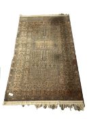 Tribal Hadklu design ground rug, with Mihrab motif enclosed by double guarded border, (125cm x 210cm