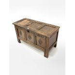 18th century oak coffer with triple panelled hinged lid and lozenge carved front on stile supports W