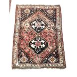 Persian design red ground rug, pole medallion enclosed by stylised decoration to border, 16cm x 116