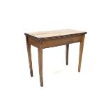 19th Century oak fold over side table raised on square tapered supports. W91cm.
