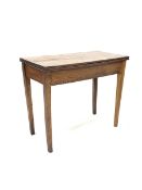 19th Century oak fold over side table raised on square tapered supports. W91cm.