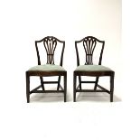 Pair of 19th century mahogany Chippendale style dining chairs, with pierced splats over drop in upho