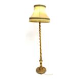 20th century gilt barley twist standard lamp on circular moulded base with turned feet, together wit