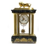Late 19th century Empire design four glass, brass and marble mantel clock, surmounted by brass lion,