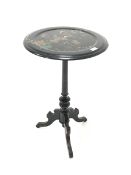 Late 19th century ebonised occasional table, the circular chinoiserie tilt top raised on ring turned