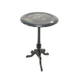 Late 19th century ebonised occasional table, the circular chinoiserie tilt top raised on ring turned