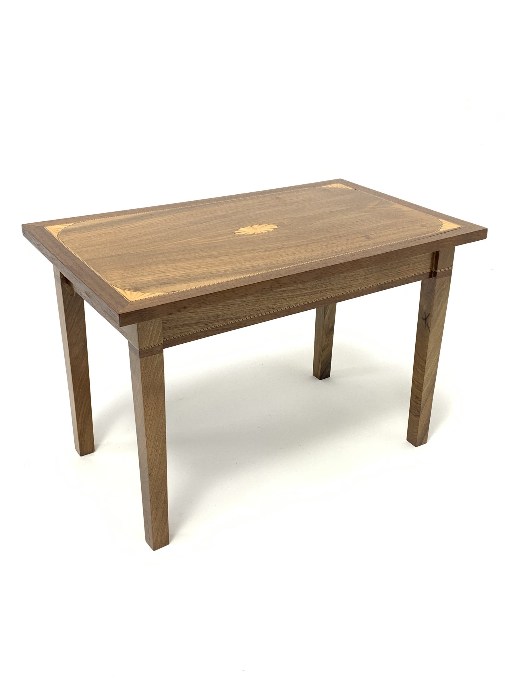 20th century walnut coffee table, rectangular top with fan inlaid spandrels, on square supports, 45c