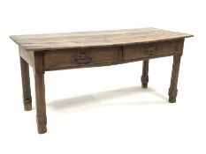 19th century French elm farmhouse kitchen work table, with two frieze drawers, raised on square cham