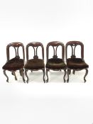 Set four Victorian mahogany balloon back dining chairs, with scroll carved detail, raised on cabriol