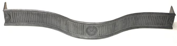 Cast iron serpentine fire fender, decorated with beading, fluting and floral roundels, W116cm