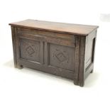 18th century oak coffer, the later top lifting to reveal plain interior, two lozenge carved panels t