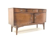 Mid century oak bow front sideboard by Harris Lebus, fitted with three drawers and two cupboards, ra