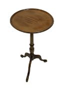 Late 20th century mahogany tripod wine table, circular moulded dished top with inlay, turned column,