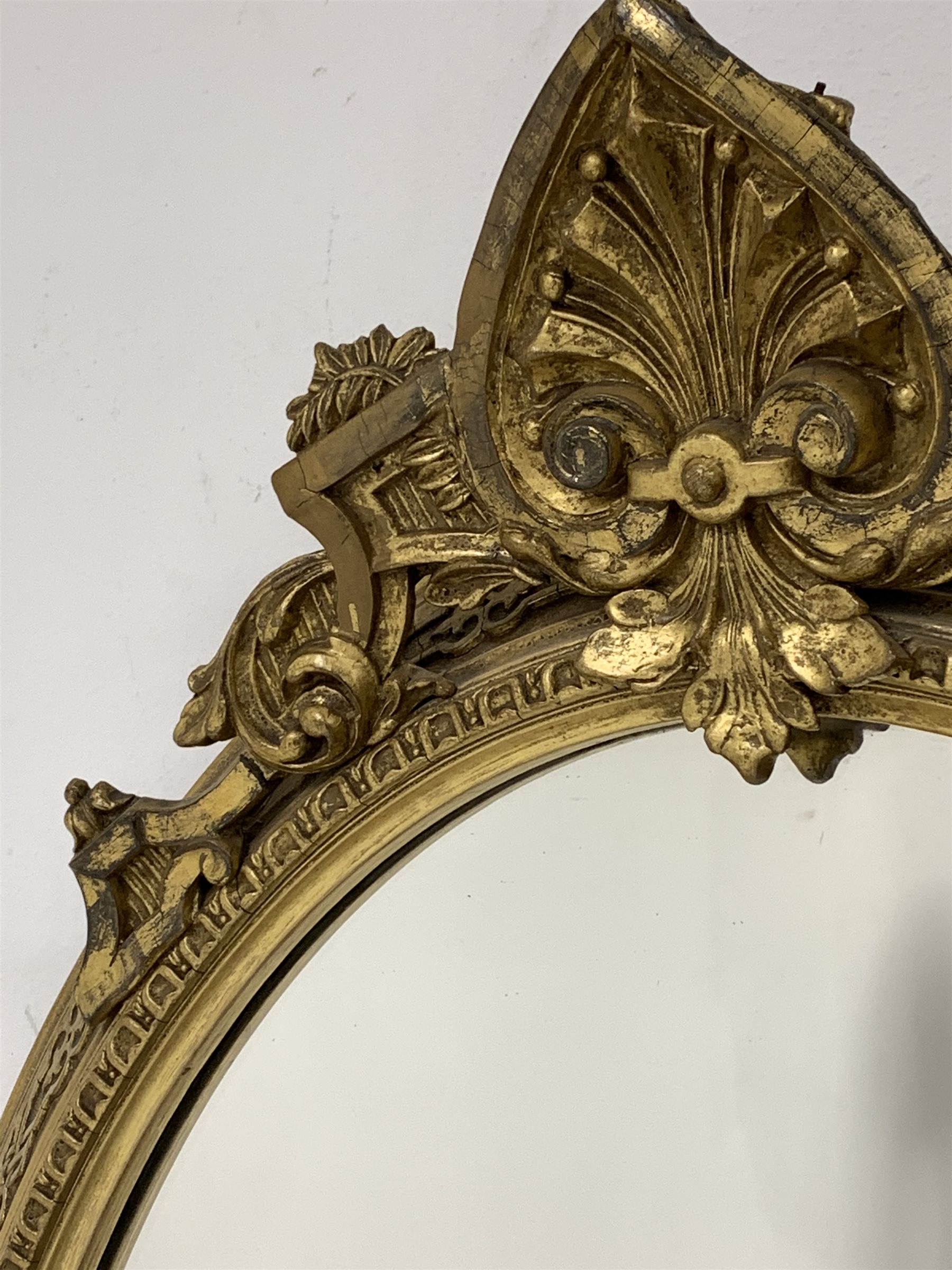 Late 19th century gilt wood and gesso framed wall mirror, anthemion pediment above oval mirror plate - Image 3 of 4