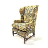 Early 19th century wing back armchair, upholstered in William Morris style liberty honeysuckle fabri