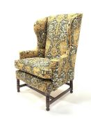 Early 19th century wing back armchair, upholstered in William Morris style liberty honeysuckle fabri