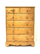 Polished pine chest, two short and four long drawers