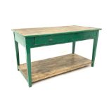 Late 19th century painted pine kitchen work table. Fitted with two drawers and raised on square tape