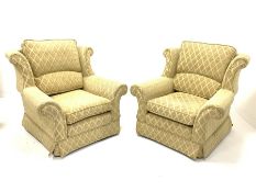 Pair armchairs upholstered in gold diamond fabric, with loose cushions, raised on castors, w93cm