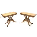 Pair of early 19th century crossbanded walnut tables for tea and cards with fold over tops, inverted