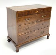 Early 19th century mahogany chest, figured frieze with inlay, three long drawers, raised on ogee bra