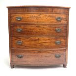 Early 19th century mahogany bow front chest, four long drawers, on turned feet, W106cm, H105cm, D58c