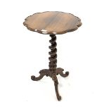 Victorian rosewood pedestal occasional table with lobed circular top. Raised on spiral turned column