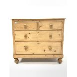 Victorian pine chest, fitted with two short and two long drawers, raised on turned supports, W92cm,