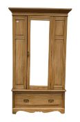 Edwardian satin walnut single wardrobe, mirrored door enclosing interior fitted for hanging, drawer