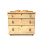 Victorian stripped pine chest, with raised back, fitted with three long graduated drawers, raised on