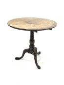 George III mahogany circular tilt top breakfast table on ring turned column column and triple splay