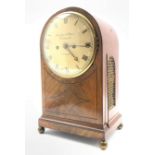 Mid 19th century mahogany cased dome top repeating bracket clock, with ebonised stringing and brass