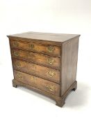 George III oak chest, fitted with four long graduated cock beaded drawers and pierced brass pull han