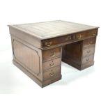 Victorian mahogany twin pedestal partners desk, the top with tooled leather inset writing surface an