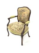 French style walnut open armchair, with needlework upholstered seat and back, raised on moulded cabr