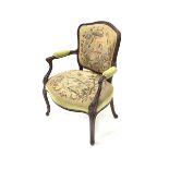 French style walnut open armchair, with needlework upholstered seat and back, raised on moulded cabr