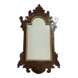 20th century Georgian style mahogany mirror, shaped fret work frame, stepped arched aperture with mo