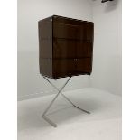 Mid 20th century two door cabinet, the top section from line bent brown frosted lucite with two shel